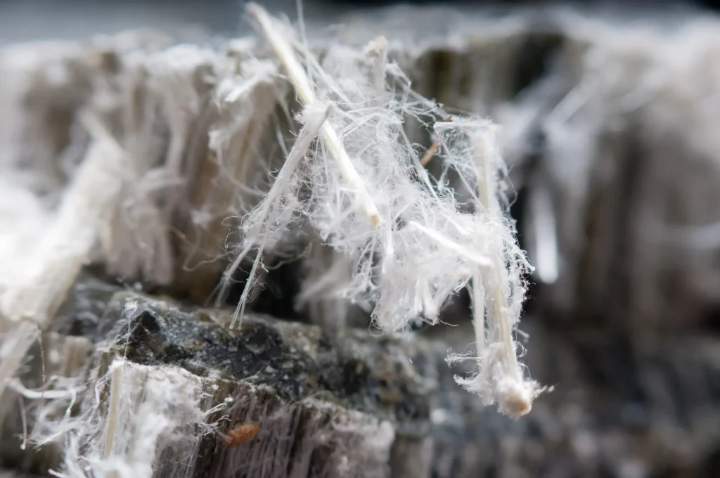 Asbestos encapsulation technician at work